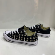 Converse All Star Nere basse personalizzate  con Borchie Argento Teschio